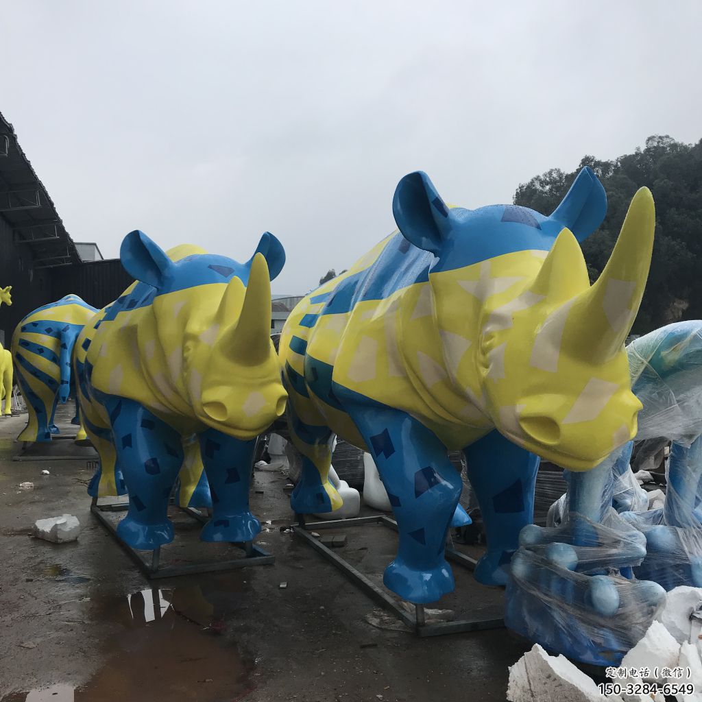 售樓部犀牛雕塑,噴砂發光雕塑,彩繪題材 售樓部犀牛雕塑,噴砂發光雕塑,彩繪題材
